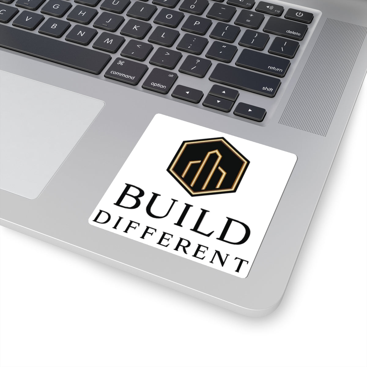 BUILD DIFFERENT — Gold & Black Emblem Vinyl Sticker